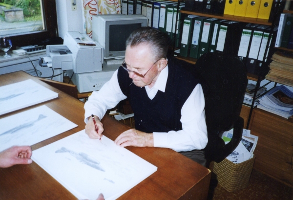 Signing the pencil drawing <i>Kette of Swallows</i> by Graeme Lothian, 26th October 1996.