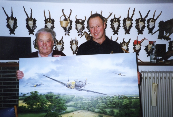 Photographed with the painting <i>Fighter General</i> and its artist Graeme Lothian.